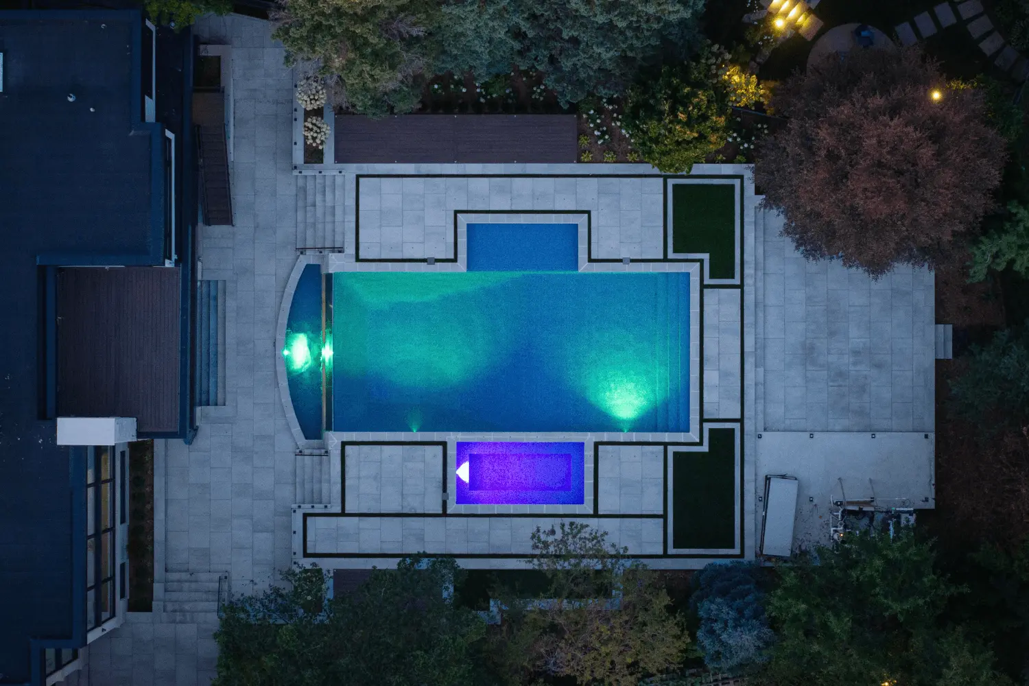 backyard interlocking with pool